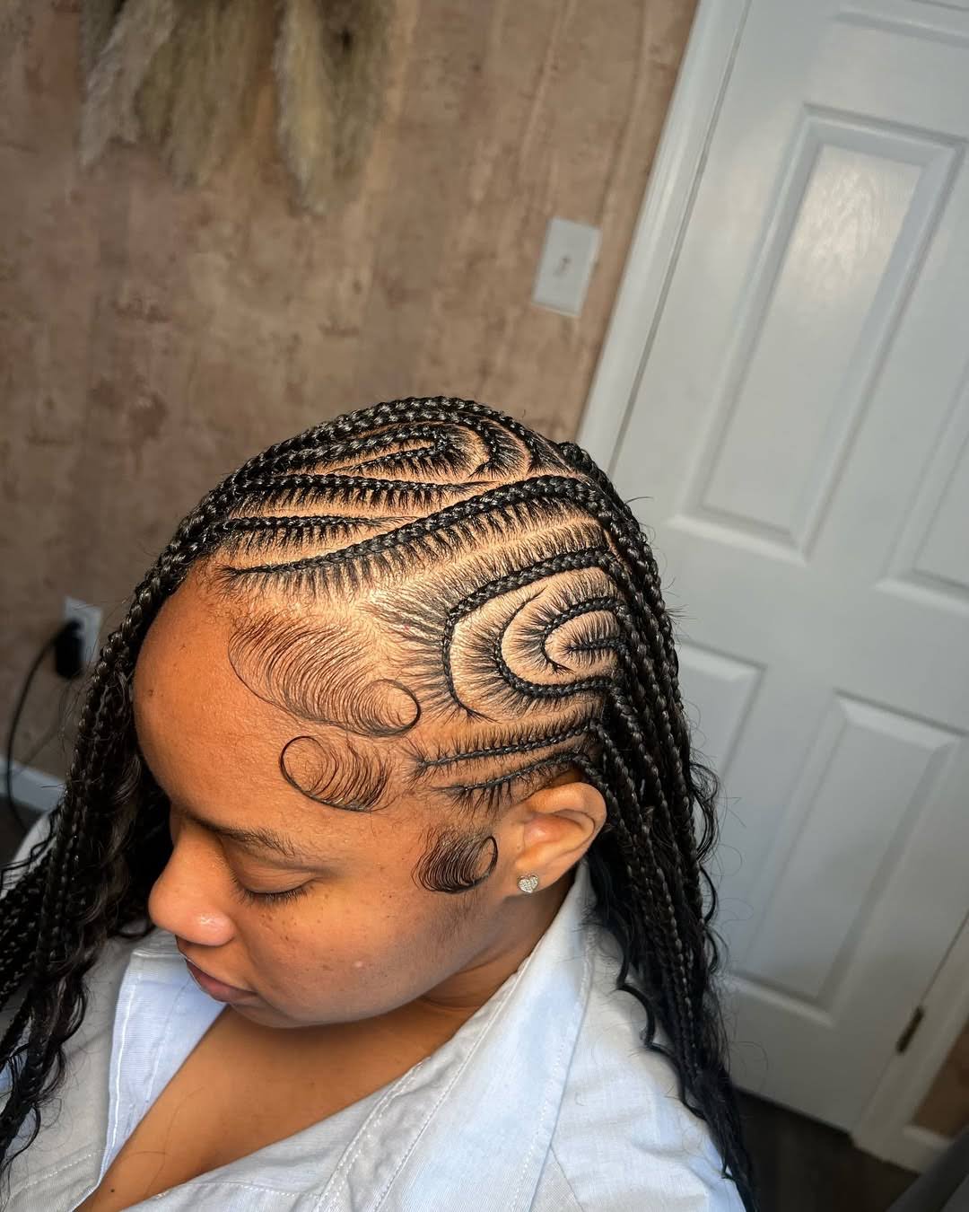 @braidedbykira